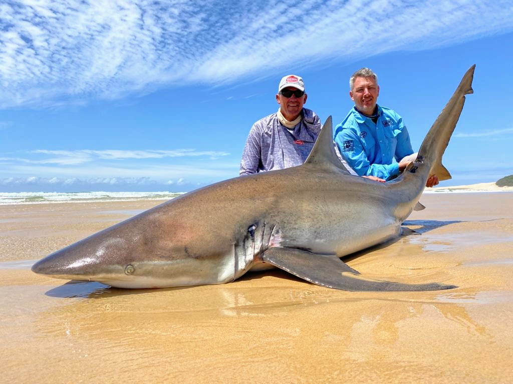 Gerhard and a client with a shark